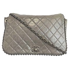 CHANEL - Calfskin Quilted Large CC Enchained Accordion - Gray Shoulder Bag Description * Circa 2015-16 * Diamond quilted gray calfskin leather * Ruthenium chain intertwined with leather with leather shoulder pad * Ruthenium Chanel CC turn lock * Dark red fabric interior * Interior zipper pocket * Includes Entrupy Certificate Measurements * Width: 11.5 in / 29.21 cm * Height: 8 in / 20.32 cm * Depth: 5 in / 12.7 cm * Strap Drop: 20 in / 50.8 cm Details * Made In: Italy * Color: Gray * Accessories: Dust Bag, Authenticity Card, Original Box * Material: Calfskin Leather Condition * Very Good * Creasing * Leather wear on shoulder strap * Leather discoloration Authenticated By: Entrupy ------------------------------- We, at BougieHabit ensure each item is first run through a thorough authenticat Dark Red Fabric, Accordion Bag, Grey Shoulder Bag, Gray Accessories, Grey Quilt, Leather Wear, Diamond Quilt, Red Fabric, Fashion Handbags