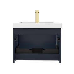 a white sink with a gold faucet on the top and black drawers underneath it