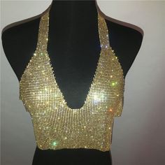 Material: Polyester Tops Type: Tank Tops Gender: Women Pattern Type: Patchwork Decoration: Hollow Out Clothing Length: Short Item Type: Tops Style: Sexy & Club Fabric Type: Broadcloth Fitted Gold Top For Festivals, Gold Tops For Club Summer Wear, Summer Gold Tops For Club, Gold Stretch Crop Top, Stretch Low-cut Party Tops, Gold Stretch Crop Top For Spring, Spring Gold Stretch Crop Top, Gold Stretch Crop Top For Summer, Gold Fitted V-neck Top