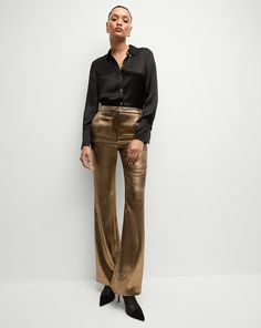 The leg-lengthening pant, now in high-impact metallic gold. The high-waisted Gracie pant is defined by a slim leg that falls to a slight flare. Pair with a simple black sweater to elevate the everyday or wear with the matching Izara dickey jacket for an evening pantsuit no one will forget.Part of our capsule collection in collaboration with model, actress and entrepreneur Poppy Delevingne.100% PolyesterLining: 86% Polyamide 14% ElastaneDry clean onlyStyle #2410NV4760494 Poppy Delevingne, Capsule Collection, Black Sweater, Veronica Beard, Slim Leg, Slim Legs, Designer Outfits Woman, Metallic Gold, Bottoms Pants