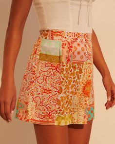 High rise Fitted waist Side zipper closure Abstract print 100% Rayon Runs Large Fitted Bottoms With Vibrant Print For Vacation, Fitted Vibrant Print Vacation Bottoms, Fitted Vibrant Print Bottoms For Vacation, Multicolor Printed Bottoms Short Length, Multicolor Printed Short Bottoms, Summer Patterned Bottoms With Pockets, Patterned Summer Bottoms With Pockets, Patterned Vacation Bottoms, Multicolor Floral Print Short Bottoms