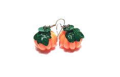 ★These Earrings feature Orange & Green Acrylic Pumpkins on Silver Hypo Allergenic Ear Wires or Sterling Silver Ear Wires. * Materials: Acrylic Resin. * Acrylic Pumpkins Charms Dimensions: * 1 inch Diameter ☀Comes in small gift box that's wrapped with hemp twine. (Handmade in USA) Fun Orange Earrings For Halloween, Fun Orange Halloween Earrings, Cute Orange Earrings For Halloween, Cute Orange Halloween Earrings, Fun Orange Jewelry For Halloween, Fun Orange Halloween Jewelry, Novelty Orange Earrings For Halloween, Pumpkin Jewelry, Orange Jewelry