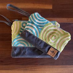 "Funky Cut Velvet with Gray Waxed Canvas, fun modern circles in Lime Green and  Aqua with a cream background.  Fully lined with 100% Cotton Duck Canvas.  Can be used as a wristlet purse, cosmetic bag, storage/organizer pouch inside a larger bag, possibilities are endless.   Small - 8 1/2\"X6\", strap is 5\" Large - 9 1/2\"X7 1/2\", strap is 5\" *measurements are approximate as these are all handmade Spot Clean Only *Pattern by Ithinksew" Electronic Storage, Electronics Storage, Special Gifts For Her, Pouch Organizer, Wristlet Purse, Duck Canvas, Cream Background, Waxed Canvas, Coin Purses