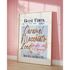 a poster on the wall in a room with pink walls and wood flooring that reads guest check