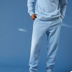 Jogger Sweatpants With Elasticized Waistband And Drawcord In Blue Faded Wash. Slant Side Pockets Back Pocket Cuffed Ankle Outseam Approx 42" 80% Cotton, 20% Polyester Casual Light Blue Loungewear Pants, Light Blue Casual Loungewear Pants, Light Blue Relaxed Fit Sweatpants For Loungewear, Blue Relaxed Fit Pants With Ribbed Cuffs, Blue Relaxed Fit Bottoms With Ribbed Cuffs, Blue Bottoms With Ribbed Cuffs And Relaxed Fit, Blue Athleisure Joggers For Lounging, Light Blue Relaxed Fit Casual Sweatpants, Blue Pants With Elastic Waistband For Loungewear