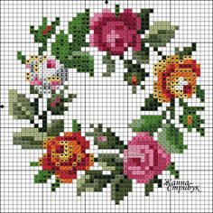 a cross stitch pattern with flowers on it