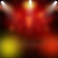 an abstract red and yellow background with spotlights