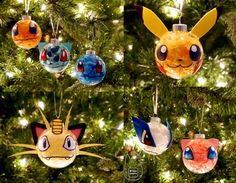 pokemon ornaments are hanging from a christmas tree