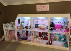 a doll house with all the furniture and accessories in it's display case is shown