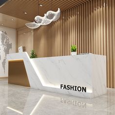 a reception area with a marble counter and planters on the wall, along with wooden slats