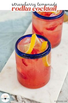 two glasses filled with strawberry lemonade and vodka