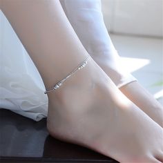 Show off your pedicure and add touch of light-catching shine to your ensemble with this elegant anklet plated in gleaming sterling silver. 0.39'' W x 9.84'' L S-hook clasp Fine silver-plated copper Elegant Anklet, Arrow Bracelet, Women Bracelets, Silver Link Chain, Women Anklets, Spring Outfits 2022, Silver Plated Bracelet, Letter Bracelet, Snake Chain Bracelets