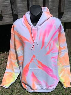 I'm always trying to come up with something new. I accidentally did this one and thought what the heck lol I'll post it. LOL.  I actually really like this simple little tie dye hoodie. I hope you do too.  Each hoodie is 50% cotton and 50% poly.  I use mens hoodies bc they are more roomy and comfortable.  WASHING INSTRUCTIONS: wash as normal in cold water. Tumble dry on low or simply hang to dry.  Have a custom order? Send me a msg and I'll see what I can come up for you.  Thanks for stopping by my shop. I hope you find something you like! :) Acid Wash Hoodie With Relaxed Fit For Spring, Acid Wash Relaxed Fit Hoodie For Spring, Trendy Acid Wash Sweatshirt With Drawstring Hood, Acid Wash Hooded Hoodie For Spring, Spring Tie Dye Hoodie With Drawstring Hood, Trendy Tie Dye Hoodie For Fall, Trendy Cotton Tie Dye Sweatshirt, Trendy Tie Dye Cotton Sweatshirt, Spring Hand-dyed Tie Dye Sweatshirt