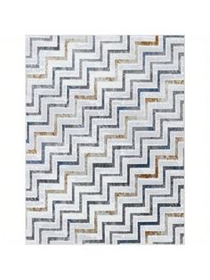 a white rug with blue and gold chevrons