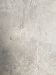 an image of a white marble textured wallpaper pattern that looks like it has been painted