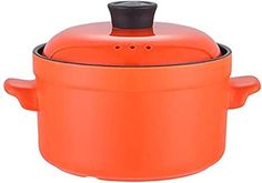 an orange casserole pot with black lid