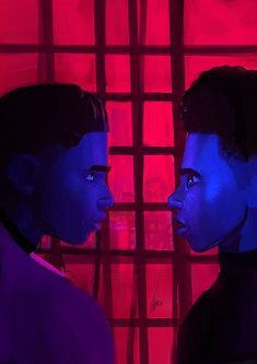 two people standing next to each other in front of a red and blue background