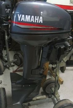 a yamaha outboard motor sitting in a garage