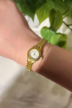 Minimalist vintage gold watch ✨ This gold tone vintage inspired quartz watch is a perfect staple piece for everyday wear. It features a delicate woven band and also comes in a silver color! - Length: 7.75 inches from one clasp to the other. - Works perfectly and has a new battery!  I suggest wiping it down with a soft cloth after each wear to ensure its longevity! Take a look at other beautiful watches here https://www.etsy.com/shop/vintagegirljewels?ref=seller-platform-mcnav As a small business Dainty Watch, Watch Minimalist, Vintage Gold Watch, Minimalist Vintage, Minimalist Watch, Watch Vintage, Vintage Women, Beautiful Watches, Staple Pieces