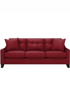 a red couch sitting on top of a white floor