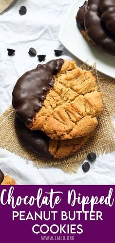 chocolate dipped peanut butter cookies on a table