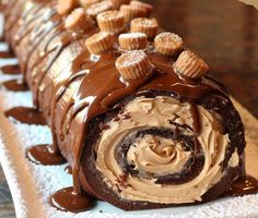 a chocolate roll covered in peanut butter frosting