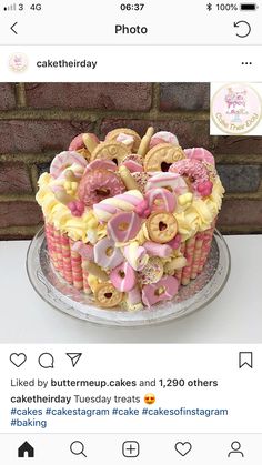 an image of a cake made to look like doughnuts