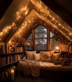 a room with a couch, bookshelf and lights in it