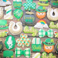 st patrick's day cookies are arranged on a table