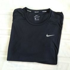 Excellent gently used pre-owned condition with minimal signs of wear and tear as seen in images. Casual Black T-shirt For Running, Casual Black Tops With Go-dry, Nike Black Go-dry T-shirt, Black Dri-fit Tops For Streetwear, Nike Go-dry Tops For Streetwear, Nike Go-dry Top For Streetwear, Nike Long Sleeve Running Top, Nike Black Running Top, Nike Black Athletic Fit Tops