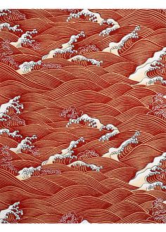 an orange and white fabric with waves on it