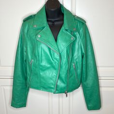 Nwt An Abbreviated Silhouette Paired With Faux Leather Updates A Classic Moto For Today's Hot Looks. Sleve Length: From Shoulder To Cuff - 25" And From Underarm To Cuff - 18" 18" Length (Size Small) Notched Lapels Zip Cuffs Lined 100% Polyester With Polyurethane Coating Machine Wash, Line Dry Trendy Green Leather Winter Jacket, Green Leather Jacket For Spring Workwear, Trendy Green Leather Jacket For Winter, Trendy Green Leather Jacket For Work, Trendy Green Biker Jacket With Zipper Closure, Green Leather Jacket With Zipper For Fall, Green Zipper Closure Outerwear For Work, Green Outerwear With Zipper For Work, Trendy Green Leather Jacket For Fall