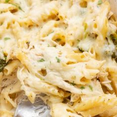 a close up of a pasta dish with broccoli