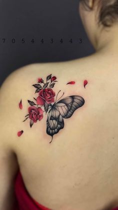 a woman with a butterfly and roses tattoo on her back