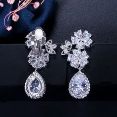 Fashion Earrings-Zircons Elegant Flower Shape Bridal Wedding Jewelry Cubic Zirconia Crystal Clip On Earings for Non Pierced Ear HoleModel Number:32842881517 Bridal Clip, Pierced Ear, Bridal Earrings Drop, Wedding Earrings Drop, Wedding Bridal Jewellery, Elegant Flowers, Cz Earrings, Lovely Earrings, White Earrings