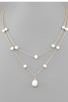 Indulge in the timeless elegance of our Pearl Layered Necklace. Handcrafted with delicate freshwater pearls and a sturdy metal chain, this necklace exudes sophistication. The lobster clasp ensures a secure fit, while the 16" length adds a touch of refinement to any ensemble. Elevate your style with this luxurious accessory.