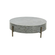 a round coffee table with two wooden legs and a white striped pattern on the top