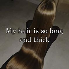 the back of a woman's head with long, shiny hair and text that reads, my hair is so long and thick