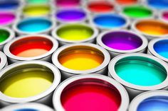 many different colors of paint are arranged in rows