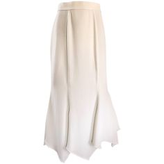 Striking vintage early 90s THIERRY MUGLER white handkerchief hem maxi skirt! Features an asymmetrical hem that looks fantastic with movement! Hidden zipper up the back with signature Mugler snaps at back center waistband. Can easily be dressed up or down. Great with a tank top, crop top, sweater, or crisp blouse. In great condition. Made in Italy. Marked Size EU 38 Measurements: 26 inch waist 38 inch hips 35-40 inches in length (asymmetrical hem) Mugler White, 90s Maxi Skirt, Asymmetrical Maxi Skirt, Maxi Skirt Tutorial, Clothes Skirts, White Handkerchief, 90s Clothes, Skirt Asymmetrical, Skirts White