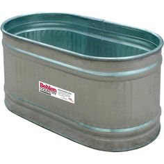 a large gray plastic tub sitting on top of a white floor