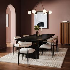 a dining room with pink walls and white chairs