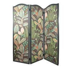 a room divider with leaves painted on the side and green foliage in the middle