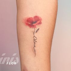 a single red flower with the word love tattooed on it's arm, in front of a pink background