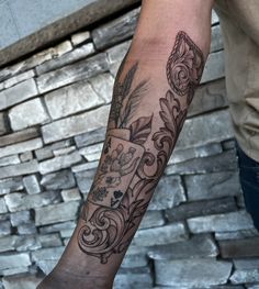 a person with a tattoo on their arm