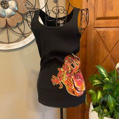 Nwot Harley Davidson Ribbed Tank Top In Black With Red And Orange Flames And Colored Rhinestones No Damage Or Missing Stones. Feel Free To Make An Offer. All Item From Smoke Free Home. Fitted Orange Cotton Tank Top, Harley Davidson Womens Clothing, Ribbed Tank Top, Red And Orange, Ribbed Tank Tops, Ribbed Tank, Black Orange, Orange Black, Harley Davidson