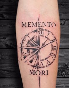 a black and white photo of a tattoo with the words, mementoo mori