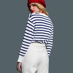 Navy and white striped light sweater top Crew neck Ribbed at collar and wrists True to size, slightly relaxed fit 60 % Polyester 40% Viscose Machine wash cold, lay flat or hang to dry The "Sailing Away Top,"is a timeless and effortlessly chic addition to your wardrobe. This navy and white striped light sweater top captures the essence of nautical charm, perfect for those breezy days by the waterfront or casual outings. Whether paired with your favorite jeans for a relaxed day out or layered for