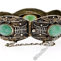 "This very well made vintage bracelet was crafted in gilt sterling silver and features a nice large size consisting of 5 wide links with domed surface adorned with absolutely amazing filigree designs and detailed work that truly make a special statement on this bracelet. Each of the links is bezel set at its center with an oval cut jade gemstone which shows gorgeous marbled green color. Remarkably unique bracelet in excellent condition and guaranteed to please. Enjoy! Material: Solid .925 Sterli Antique Oval Silver Bracelets, Antique Silver Oval Bracelets, Ornate Oval Engraved Bracelets, Ornate Hallmarked Oval Bracelets, Antique Oval Hallmarked Bracelet, Ornate Oval Hallmarked Bracelets, Victorian Oval Engraved Bracelets, Antique Oval Engraved Bracelets, Vintage Oval Engraved Bracelets