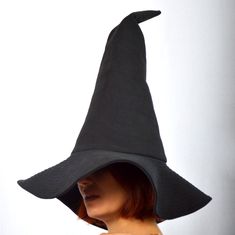 Luxurious witch or sorcerer's hat made of high quality dense cotton fabric. There is a black cotton lining inside. Рleasant softness, it retains well the shape that you want to give it. Sharp top, curved top, lowered or flat brim are all possible. This hat is ideal for costumes and every-day sorcery alike. In addition, it can be washed in warm water and ironed with a steam generator. Looks great with cardigans, coats and cloaks. Hat height - 41 cm / 16 inches Brimmed Diameter - 42 cm / 16.5 inch Black Hat For Cosplay, Fitted Black Witchy Hat, Black Fitted Witchy Hat, Black Hat For Cosplay, One Size Fits Most, Black Gothic Hat For Cosplay, Black Cosplay Hat, One Size Fits Most, Black Cosplay Hat One Size Fits Most, Witchy Black Brimmed Costume Hat, Black Witchy Brimmed Costume Hat